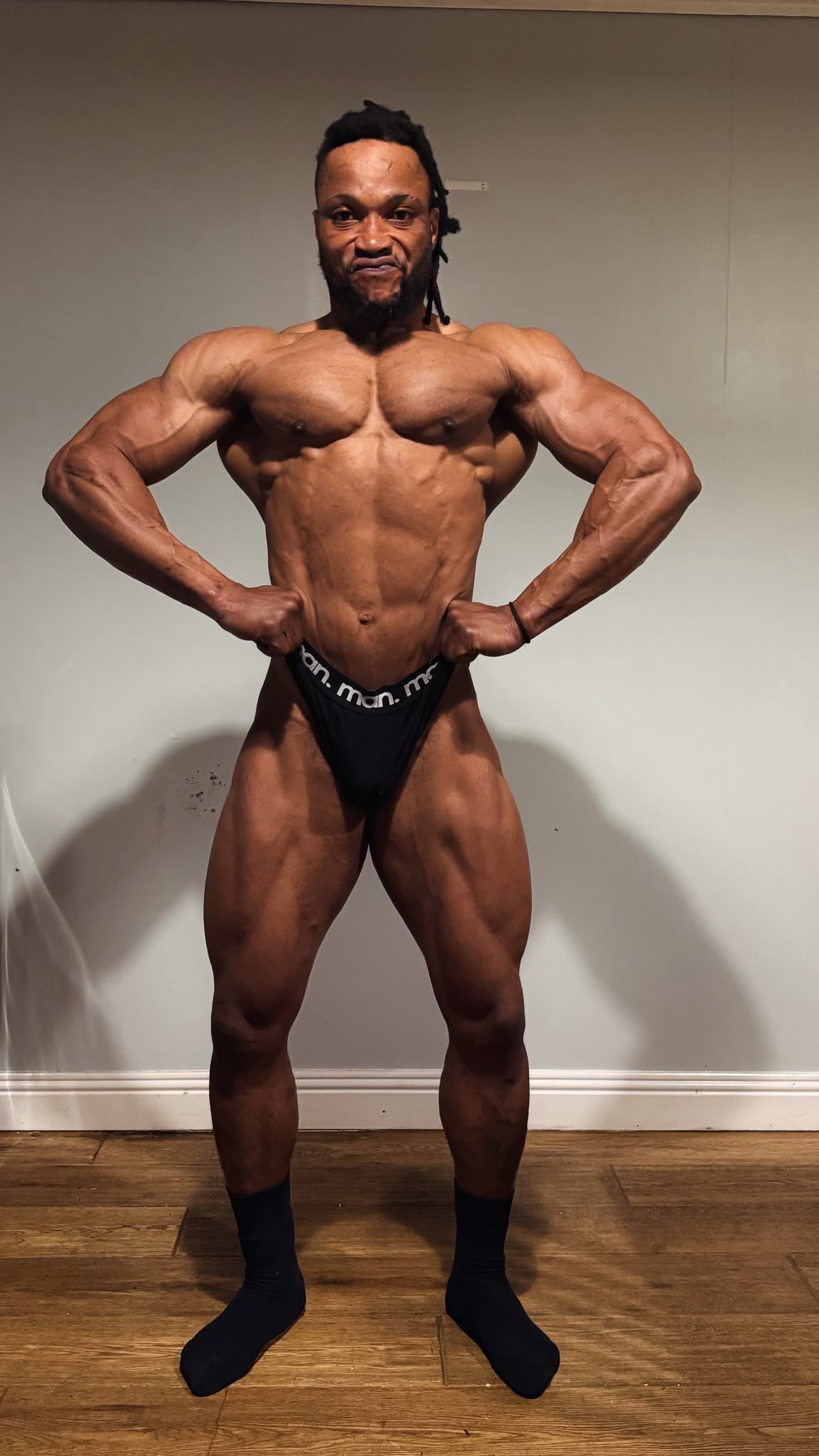 Christian Ebor in competition condition, front double-biceps pose